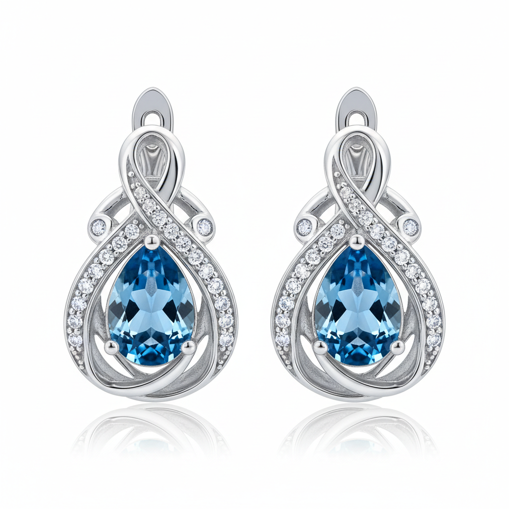 Sterling silver teardrop earrings with blue topaz gemstone