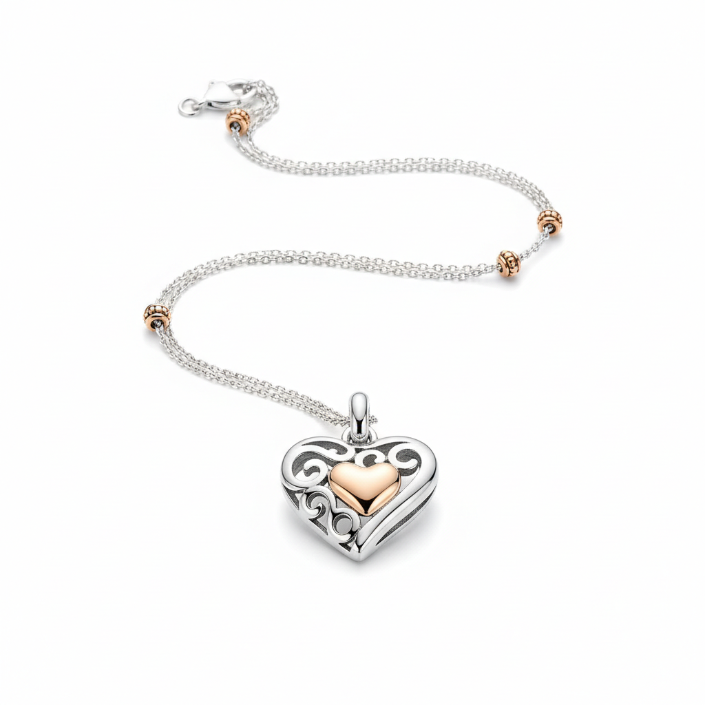 Sterling silver heart pendant necklace with rose gold accents