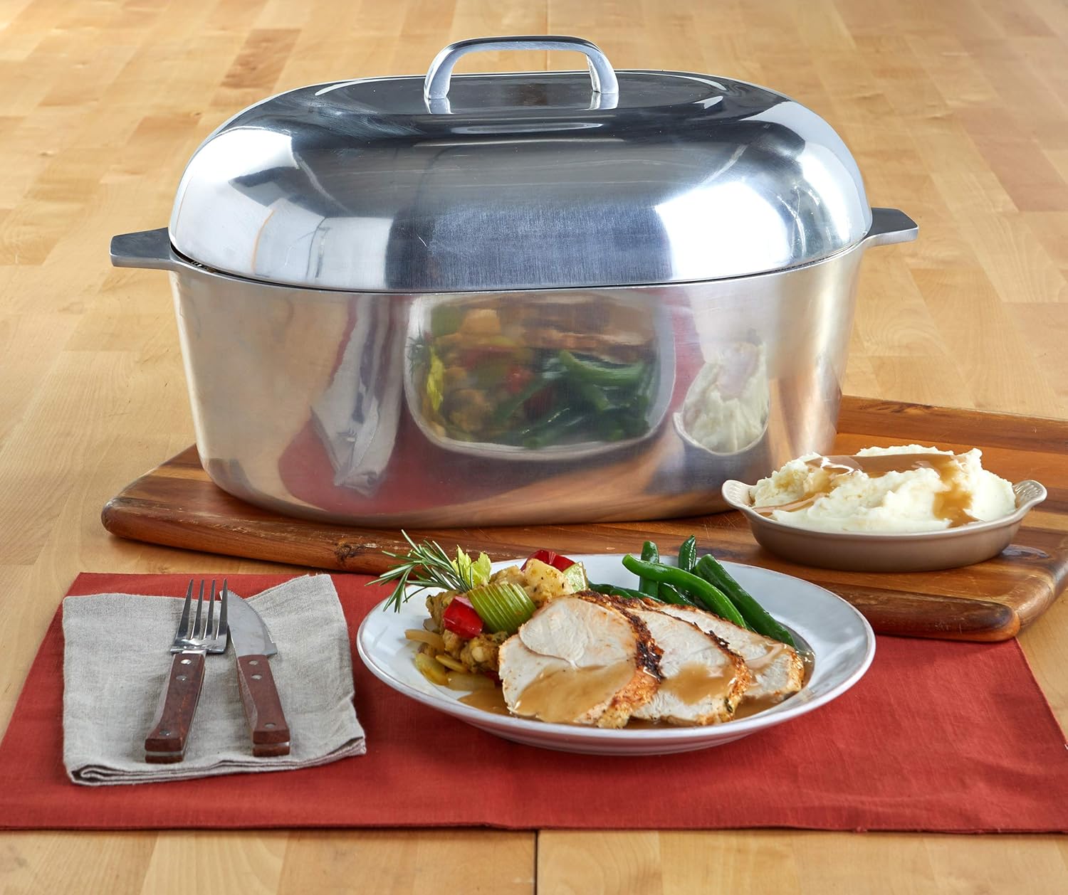 imusa-cajun-18-heavy-duty-cast-aluminum-oval-roaster-with-steamer-inserts-silver-5154